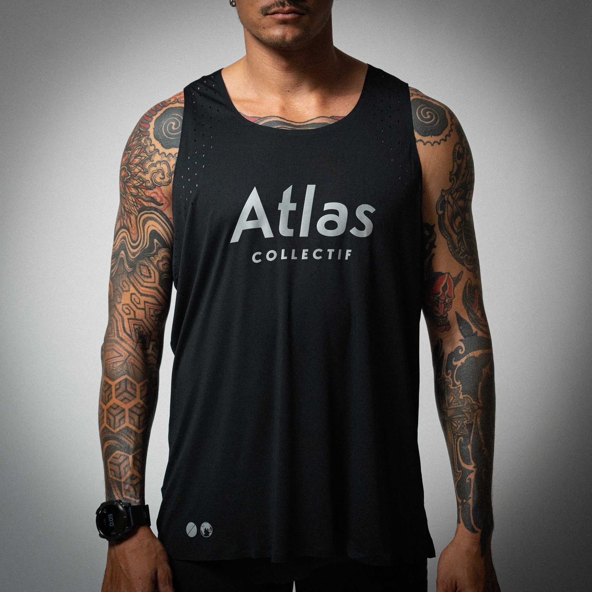 Illumi Trax Running Tank Black with reflective prints, ultra-lightweight and breathable fabric.